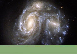 Foto mit Link zur Bildergalerie: Zwei kollidierende Spiralgalaxien mit der Bezeichnung Arp 272