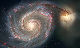 Kleines Foto zeigt die Spiralgalaxie M 51 (Whirlpool) mit Begleiter