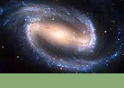 Foto mit Link zur Bildergalerie: Balken-Spiralgalaxie NGC 1300